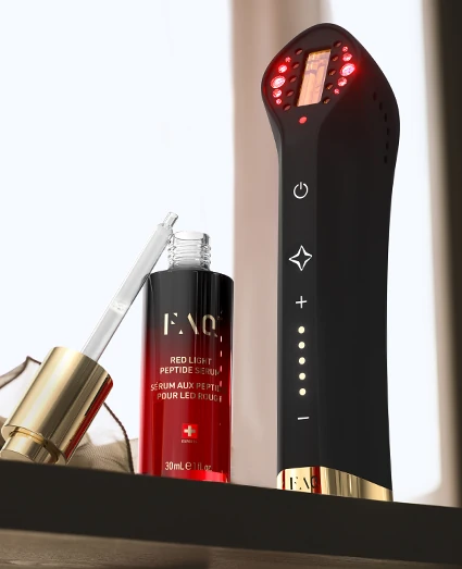 Versión en color negro del FAQ 501 con luz roja y sérum facial para uso combinado